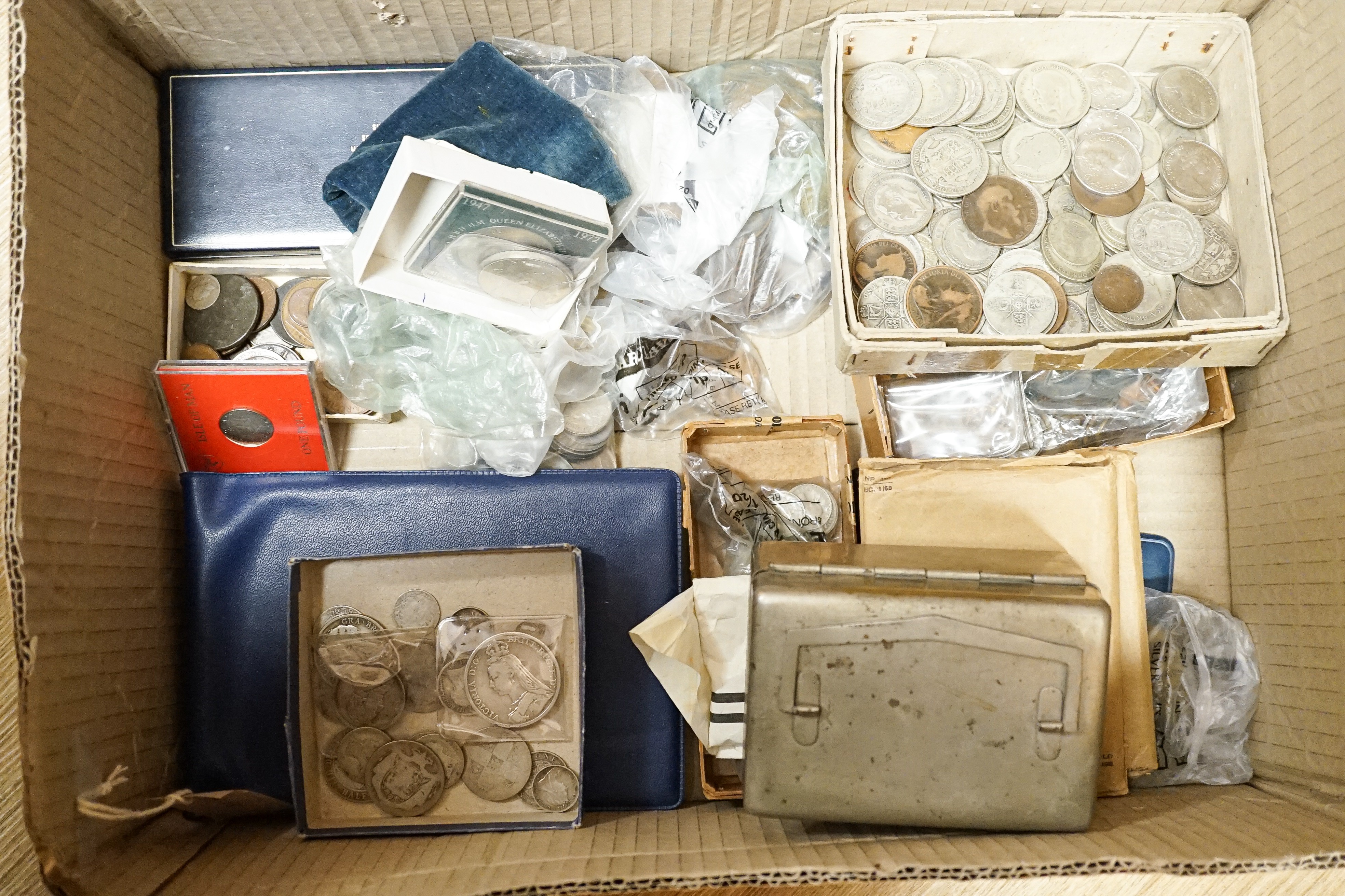 A group of 19th/20th century UK and World coins including florins and crowns